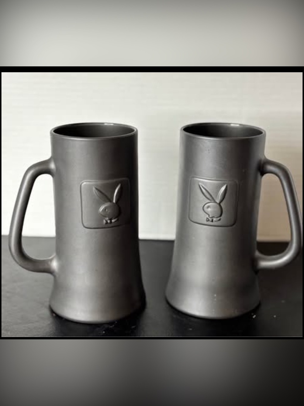 Vintage Embossed Playboy Club Beer Stein Black Matt Finish Set of 2 
6.5” tall